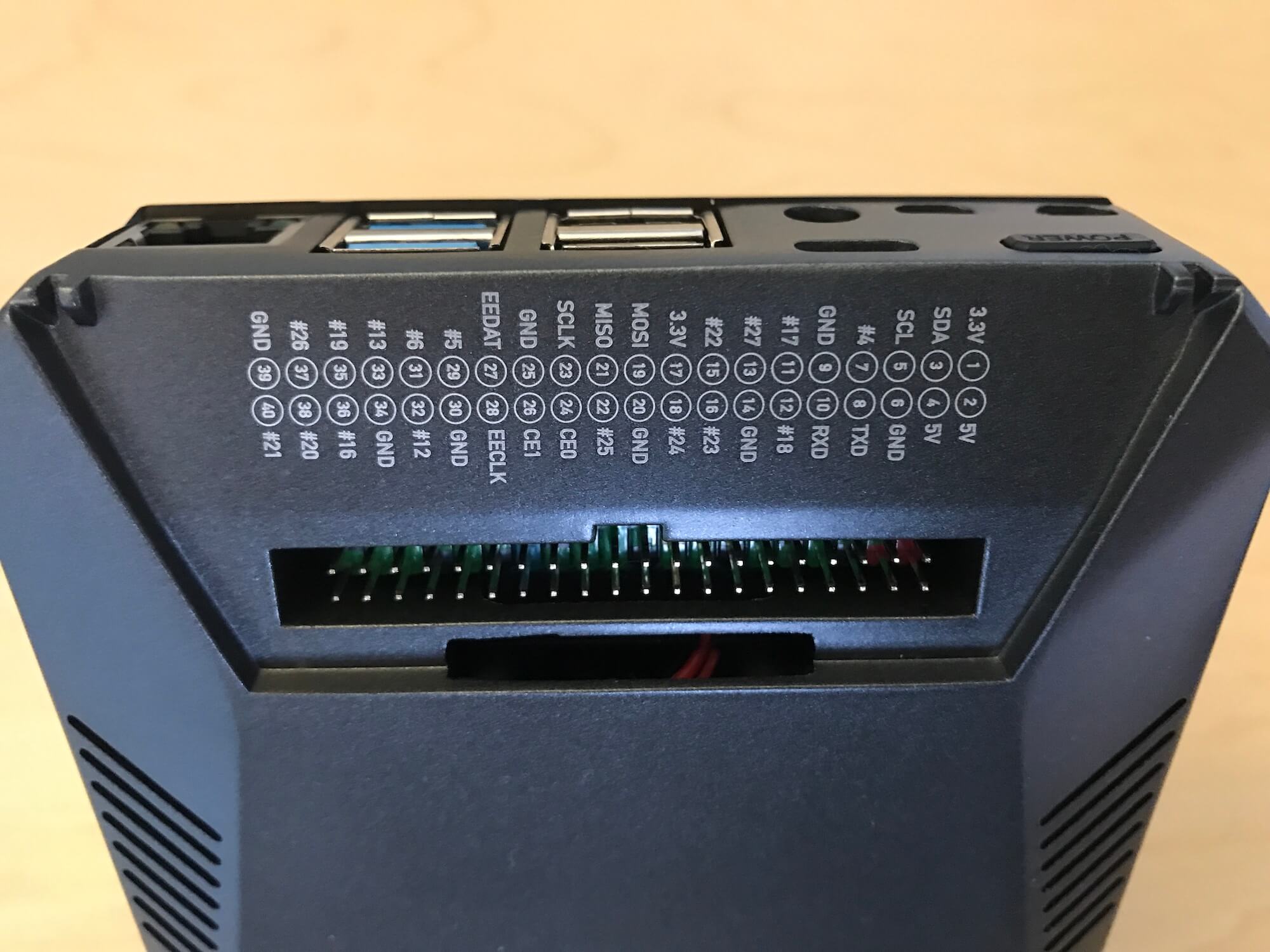 Access to GPIO ports via removable magnetic cover